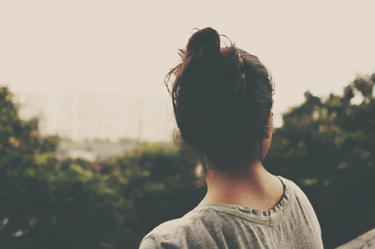 woman looking into the sky